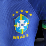 Segunda equipación Stadium Brasil 22-23 escudo