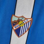 Camiseta Málaga Local 2022-2023 escudo
