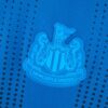 Camiseta Newcastle alternativa 2022-2023 escudo