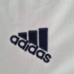 Camiseta Retro Real Madrid primera equipación 2000 logo