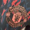 Camiseta Manchester United entrenamiento 2022-2023 - Versión jugador escudo