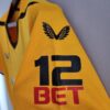 Camiseta Wolves primera equipación 2022-2023 lateral manga