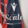 Camiseta Bolonia primera equipación 2022-2023 lateral manga