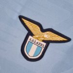 Camiseta Lazio primera equipación 2022-2023 escudo