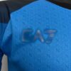 camiseta napoli 2023 logo