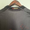 Camiseta del AC Milan x Koché cuarta equipación 2022-2023 dorso del cuello