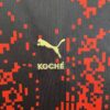 Camiseta del AC Milan x Koché cuarta equipación 2022-2023 logo 1