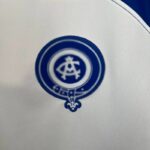 camiseta atlético de madrid azul y blanco escudo