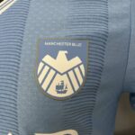 camiseta manchester city local escudo