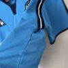 camiseta retro manchester city lateral