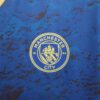 camiseta edición especial manchester city azul escudo