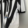 camiseta newcastle 2024 lateral