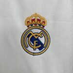 camiseta real madrid 2023-2024 escudo