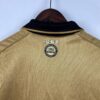 camiseta manchester united 2001 dorada cuello anterior