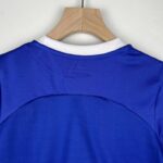 camiseta atlético madrid niño azul cuello anterior