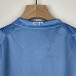 camiseta manchester city niño 2024 cuello anterior