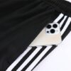 chandal manchester united 2023 bolsillo del pantalón