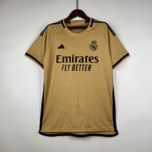 camiseta real madrid 2024 dorado