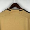 camiseta real madrid 2024 dorado cuello anterior
