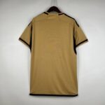 camiseta real madrid 2024 dorado dorsal