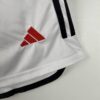 pantalón corto manchester united 2024 logo