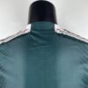 segunda equipacion manchester united 2024 cuello anterior