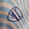 camiseta arsenal stella azul rosa escudo