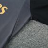 axila de la sudadera del chandal real madrid gris