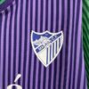 camiseta málaga 23 24 escudo