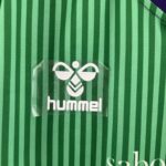 camiseta málaga 23 24 logo hummel
