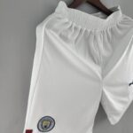 pantalon corto manchester city escudo