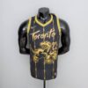 camiseta raptors negra y dorada