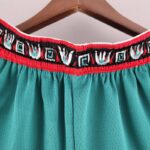 pantalon corto memphis turquesa cintura roja