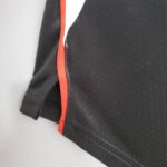 pantalon corto negro clippers diseño lateral 1 rojo