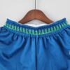 pantalon corto timberwolves celeste cintura delantera con diseño de arboles verdes