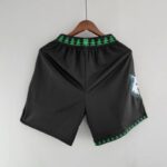 pantalon corto timberwolves retro parte trasera con la cintura de diseño de arboles verdes y en la basta