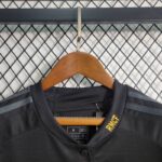 camiseta real madrid negra mujer cuello en v con boton