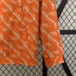 chaqueta reversible de países bajos bolsillo y manga reversible