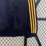 chaqueta reversible real madrid bolsillo y manga