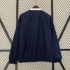 chaqueta reversible del real madrid blanco y negro dorsal reversible .