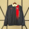 chaqueta reversible del real madrid blanco y negro frontal ,
