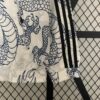 chaqueta reversible del real madrid dragon chino bolsillo y ,anga
