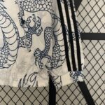 chaqueta reversible del real madrid dragon chino bolsillo y ,anga