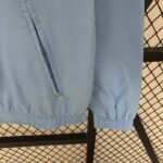 chaqueta reversible tottenham hotspur manga y bolsillo