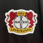 camiseta leverkusen campeon escudo