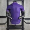 camiseta morada real madrid espalda