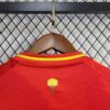 conjunto españa 2025 flor del cuello trasero