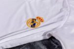 camiseta real madrid centenario escudo