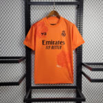 camiseta real madrid naranja