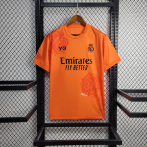 camiseta real madrid naranja